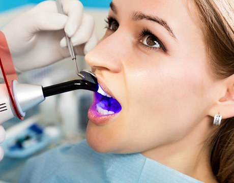 woman getting dental bonding 