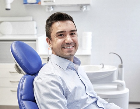 man smiling in dental chair