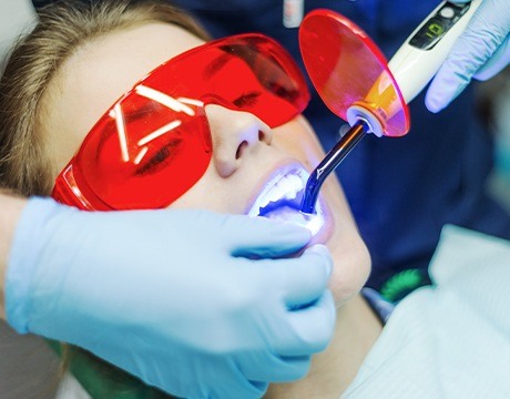 Patient receiving dental bonding