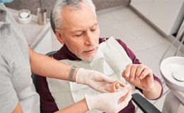 Man getting dentures at the dentist