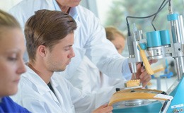 dental technicians working on the denture creation process