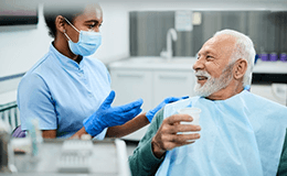 a patient getting a tooth replacement in Gainesville