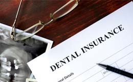 dental insurance form on table