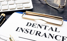 Dental insurance form resting on a table