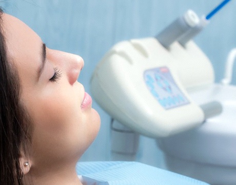 Woman relaxes while visiting IV sedation dentist