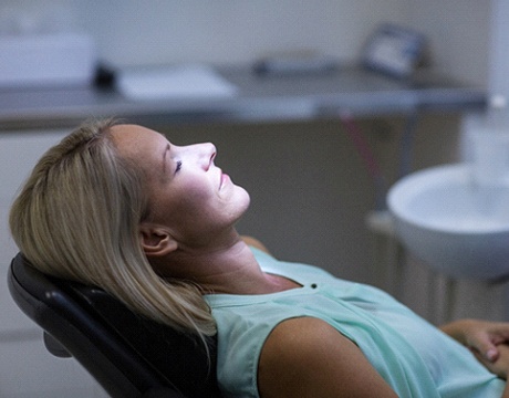 Woman relaxes while visiting Gainesville sedation dentist