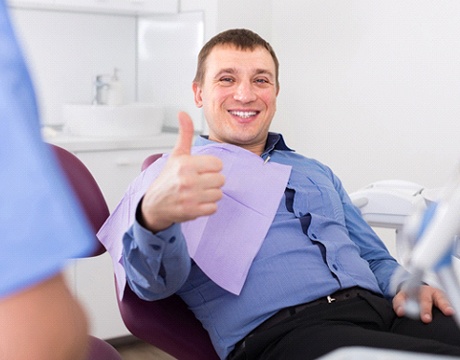 Man gives a thumbs-up to his IV sedation dentist