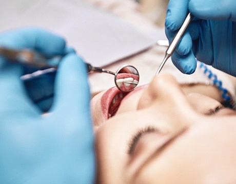 Gainesville sedation dentist working on patient 