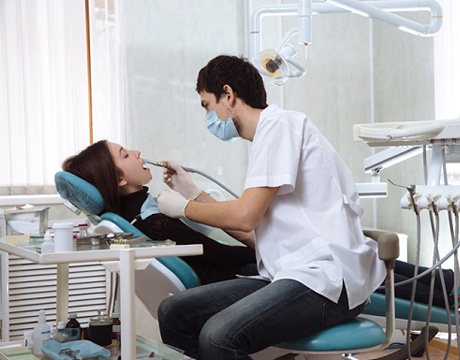 Woman relaxed in dental chair.