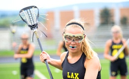 teenage girl athlete wearing a mouthguard