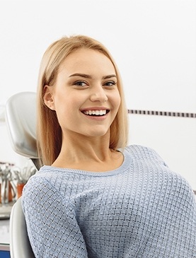 Smiling woman in dental chair