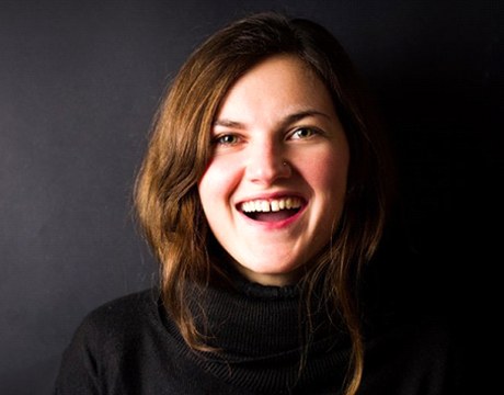 woman smiling after getting tooth-colored fillings in Gainesville