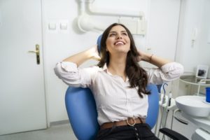 Relaxed woman visiting her Gainesville sedation dentist
