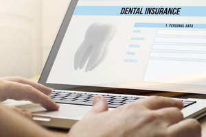 Dental insurance form on a laptop