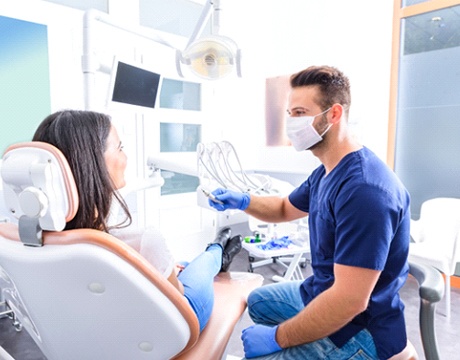 Patient at dentist for root canal therapy in Gainesville